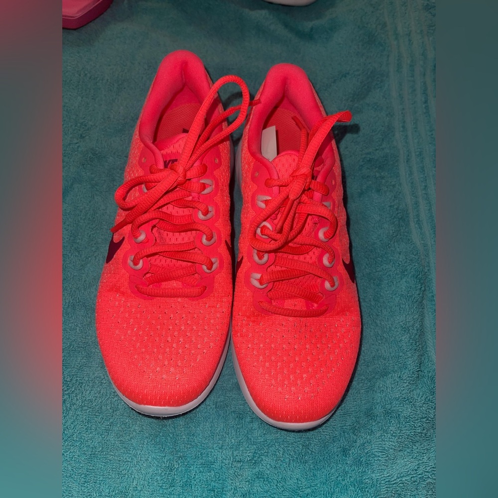 Nike coral pink women’s running shoes